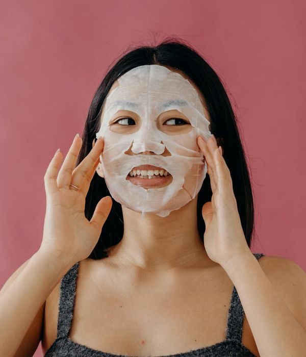 A smiling person looking refreshed and full of vitality.