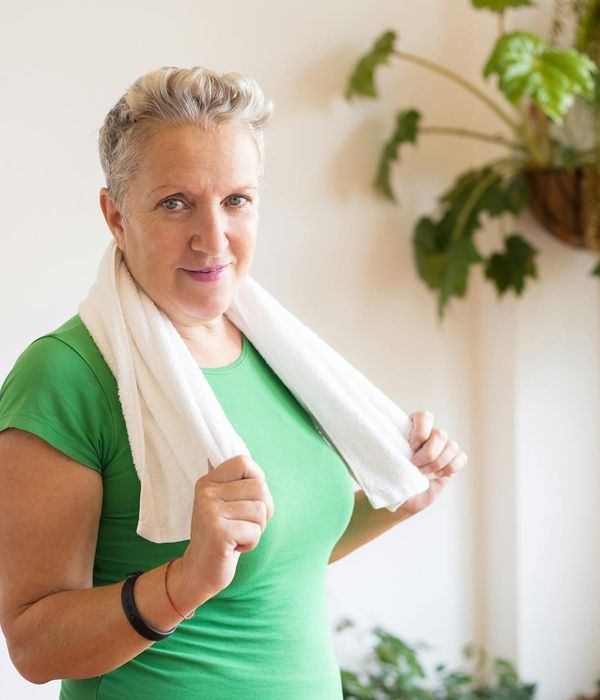 Person feeling energetic and vital after a home workout.